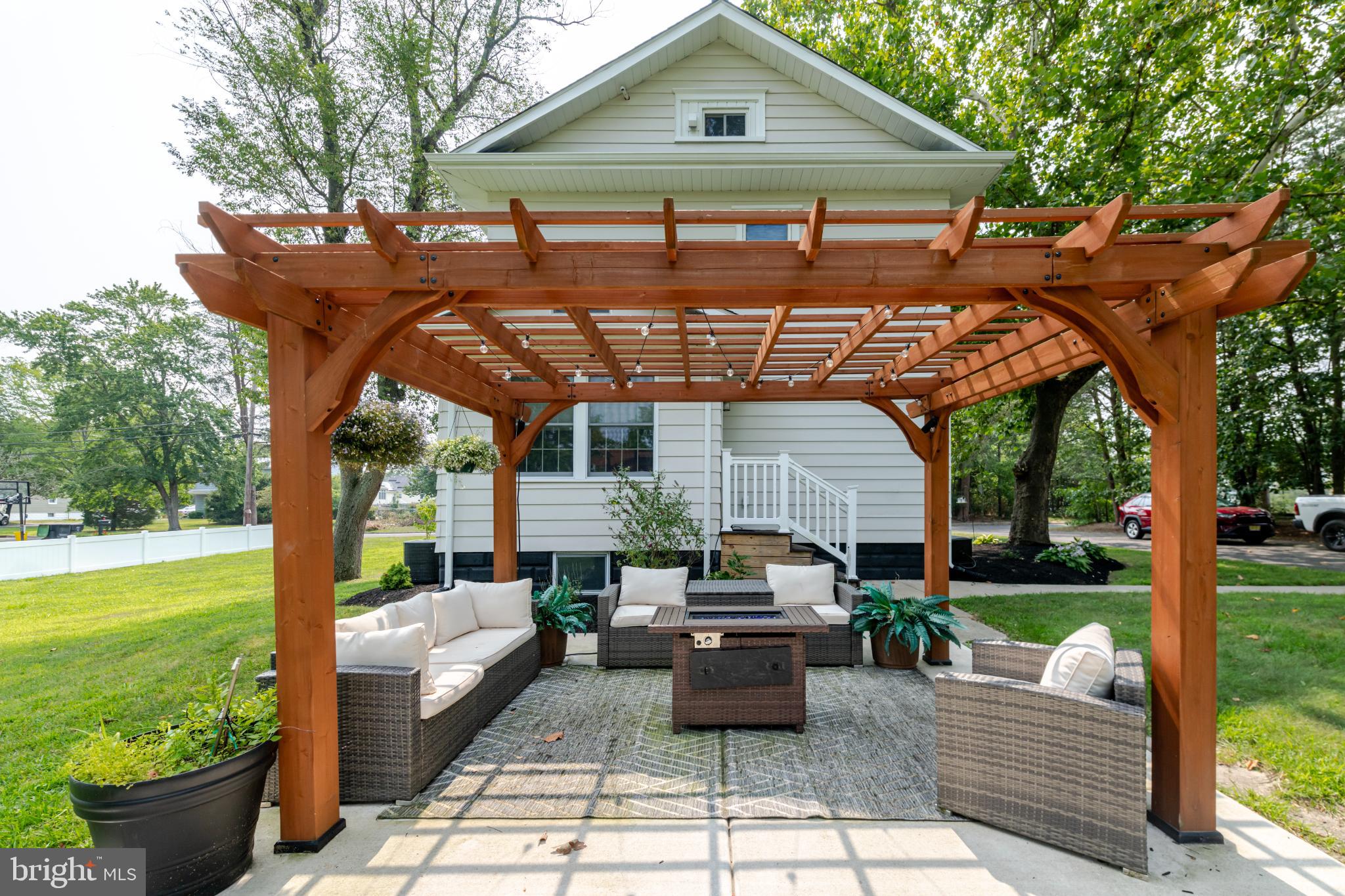 16 Townsend Avenue Berlin, NJ 08009 - Photo 37 of 50 a patio with yard table and chairs