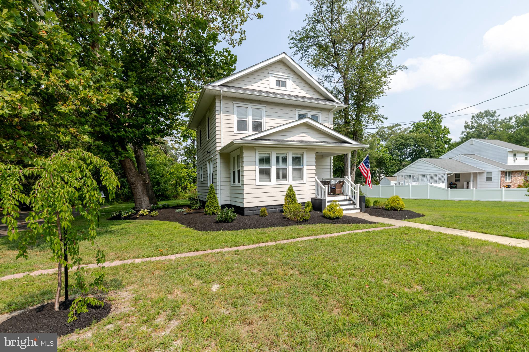 16 Townsend Avenue Berlin, NJ 08009 - Photo 4 of 50 a front view of a house with a yard