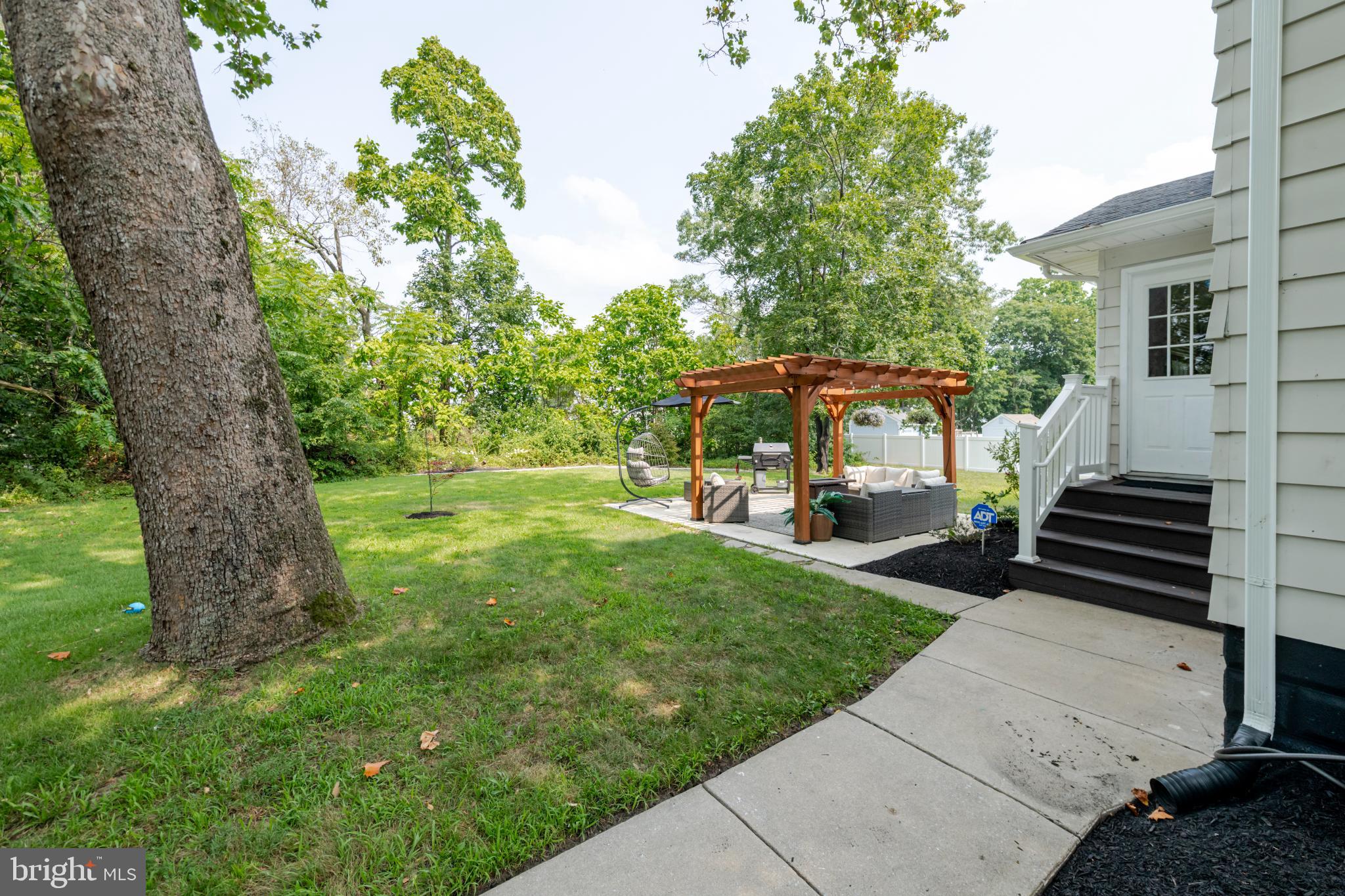 16 Townsend Avenue Berlin, NJ 08009 - Photo 42 of 50 a view of a park with a bench