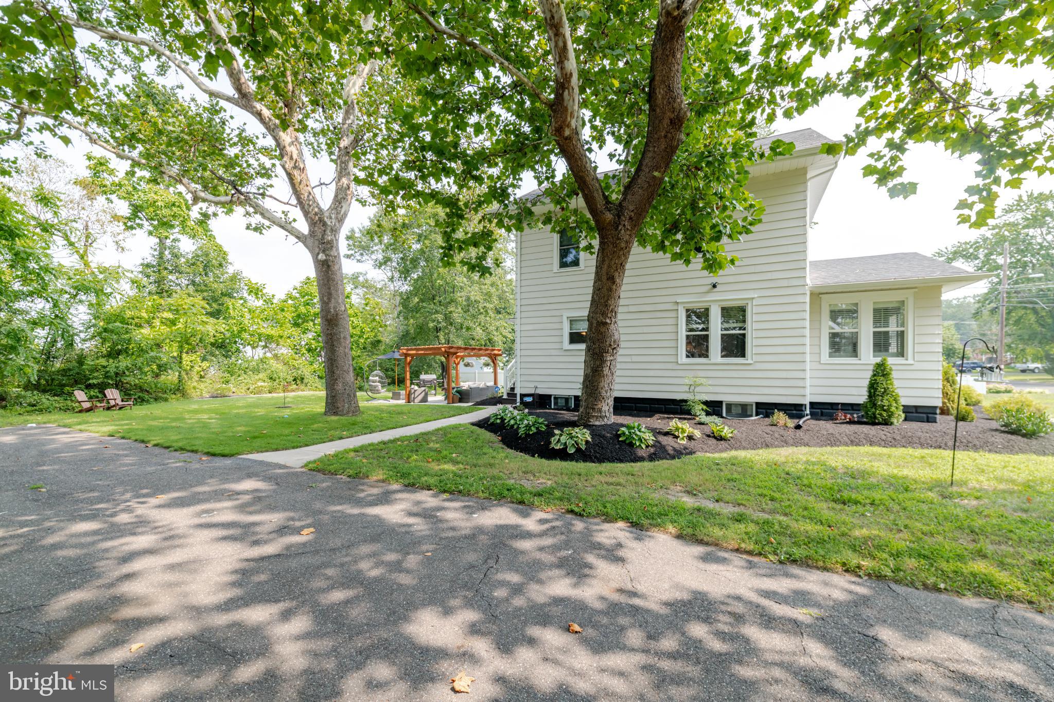 16 Townsend Avenue Berlin, NJ 08009 - Photo 43 of 50 a view of a house with a yard