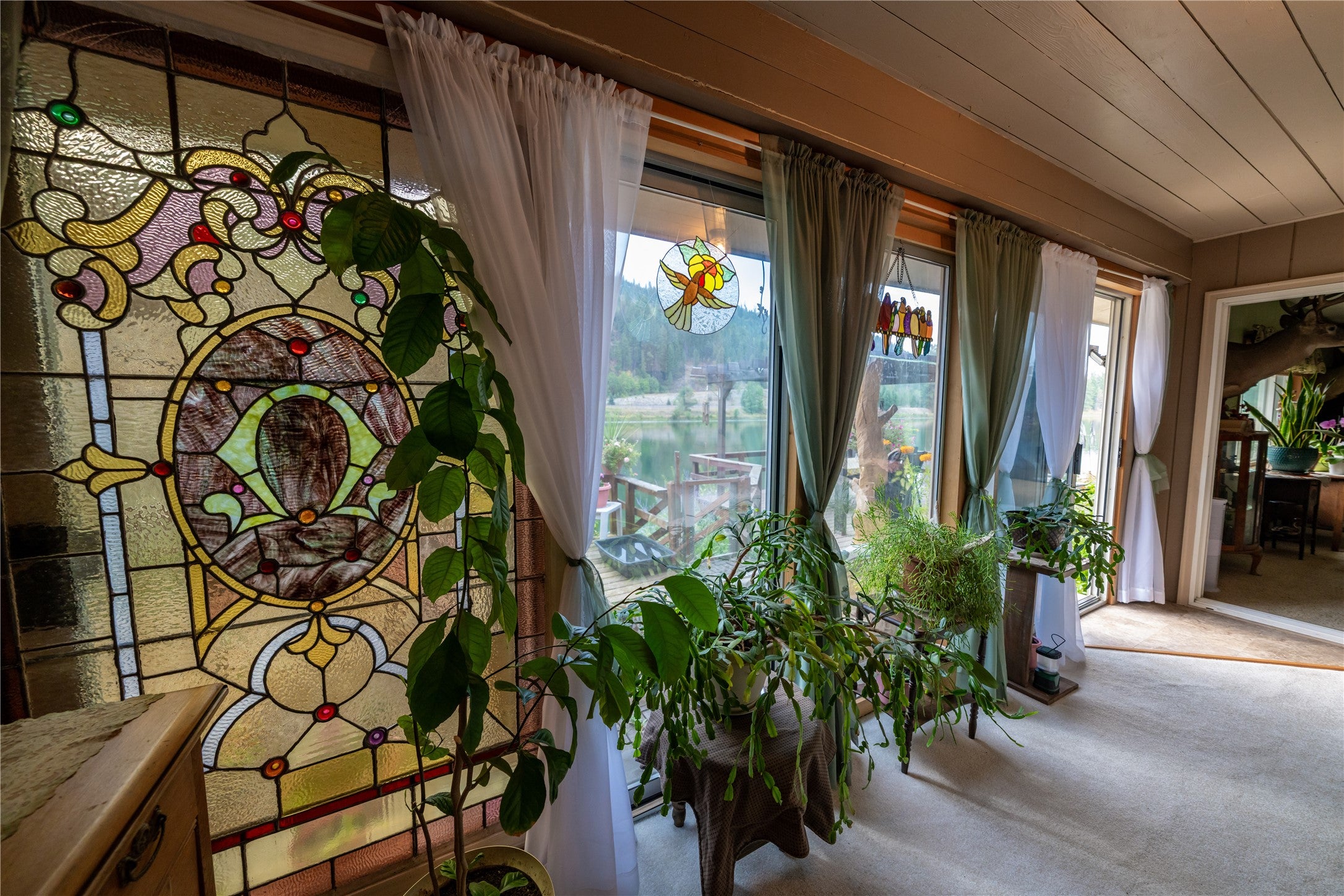 644 Waterfront Road Troy, MT 59935 - Photo 42 of 66 Sunroom/bedroom
looking out to the Kootenai River