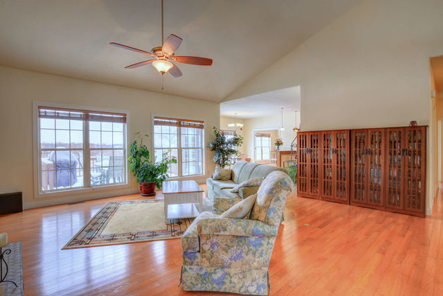 8038 Adam Road Weldon, IL 61882 - Photo 11 of 53 a living room with furniture and a large window