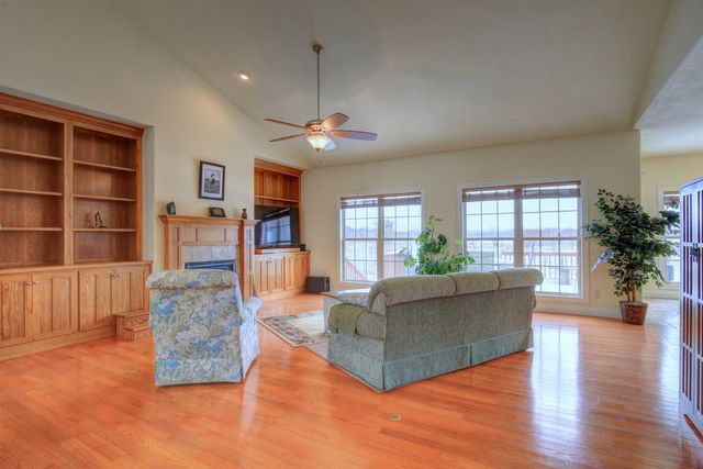 8038 Adam Road Weldon, IL 61882 - Photo 12 of 53 a living room with furniture and a large window
