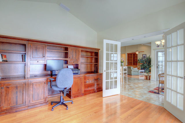 8038 Adam Road Weldon, IL 61882 - Photo 22 of 53 a view of a livingroom with workspace and a window