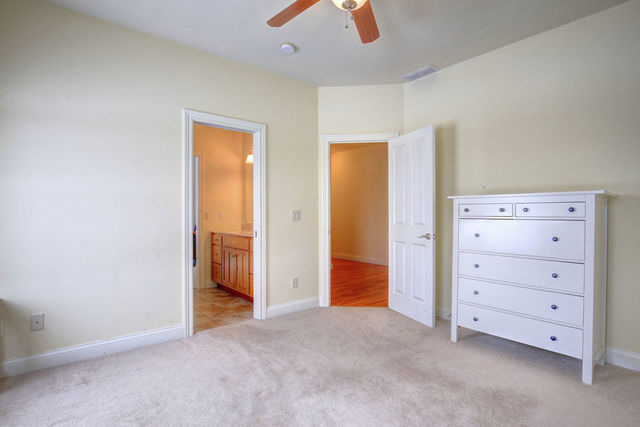 8038 Adam Road Weldon, IL 61882 - Photo 30 of 53 a view of an empty room with a ceiling fan
