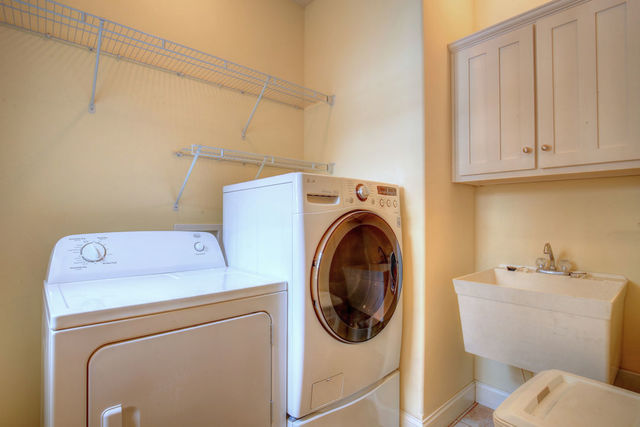 8038 Adam Road Weldon, IL 61882 - Photo 32 of 53 a utility room with dryer and washer