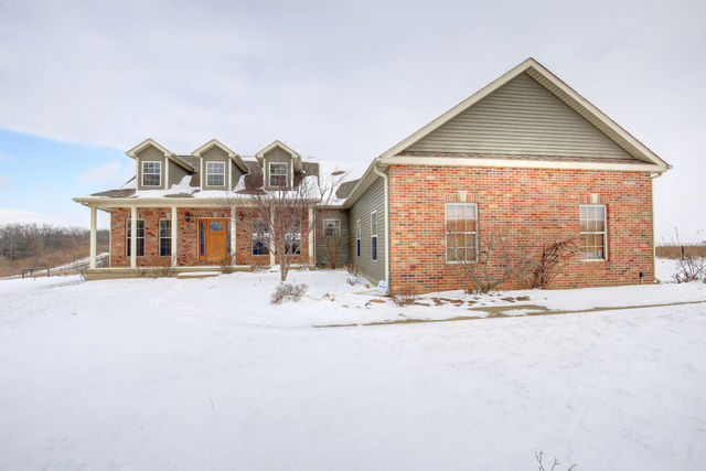 8038 Adam Road Weldon, IL 61882 - Photo 40 of 53 a view of a house with a yard and sitting area