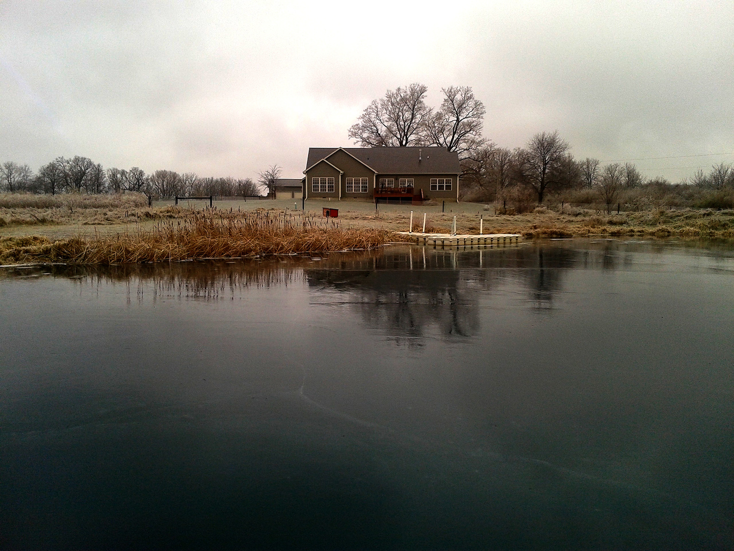 8038 Adam Road Weldon, IL 61882 - Photo 5 of 53 a view of a lake with houses in outdoor space