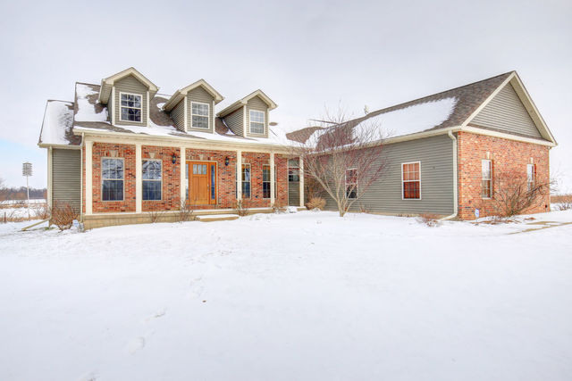 8038 Adam Road Weldon, IL 61882 - Photo 6 of 53 front view of a house with a yard
