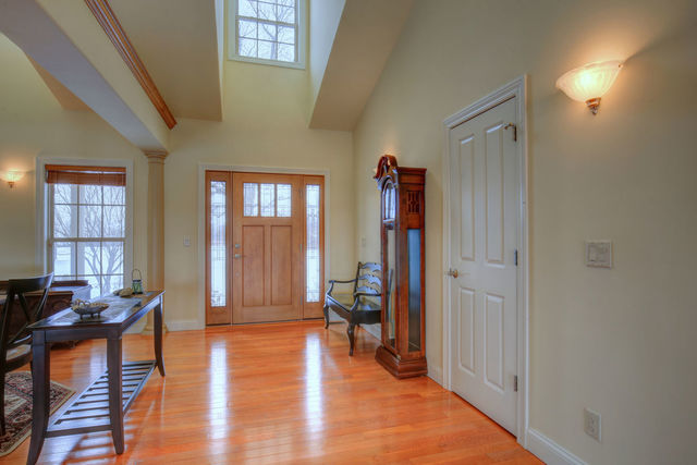 8038 Adam Road Weldon, IL 61882 - Photo 8 of 53 a view of a livingroom with furniture and hardwood floor