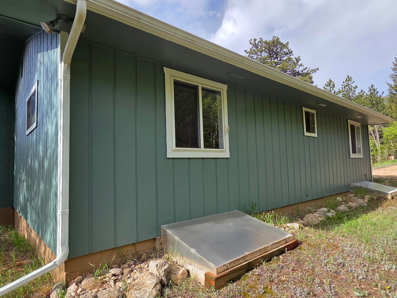 328 North Skinner Road Allenspark, CO 80510 - Photo 8 of 41 Back side of Home