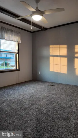 a view of a livingroom with a staircase