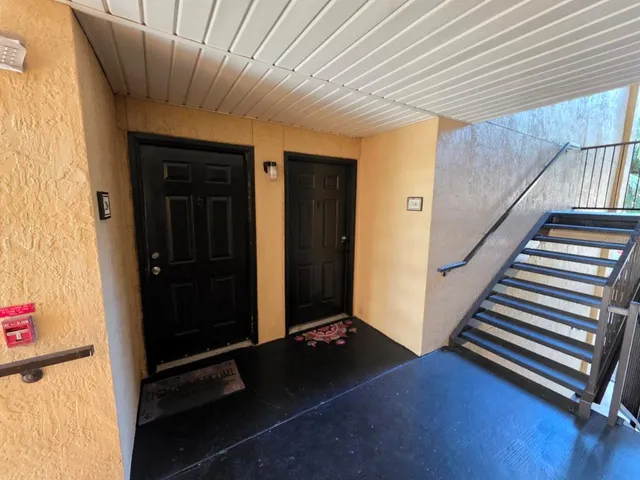 a view of a hardwood & staircase