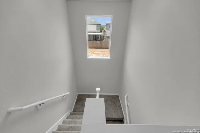 a view of back yard of the house