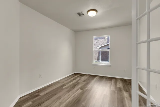 an empty room with a window