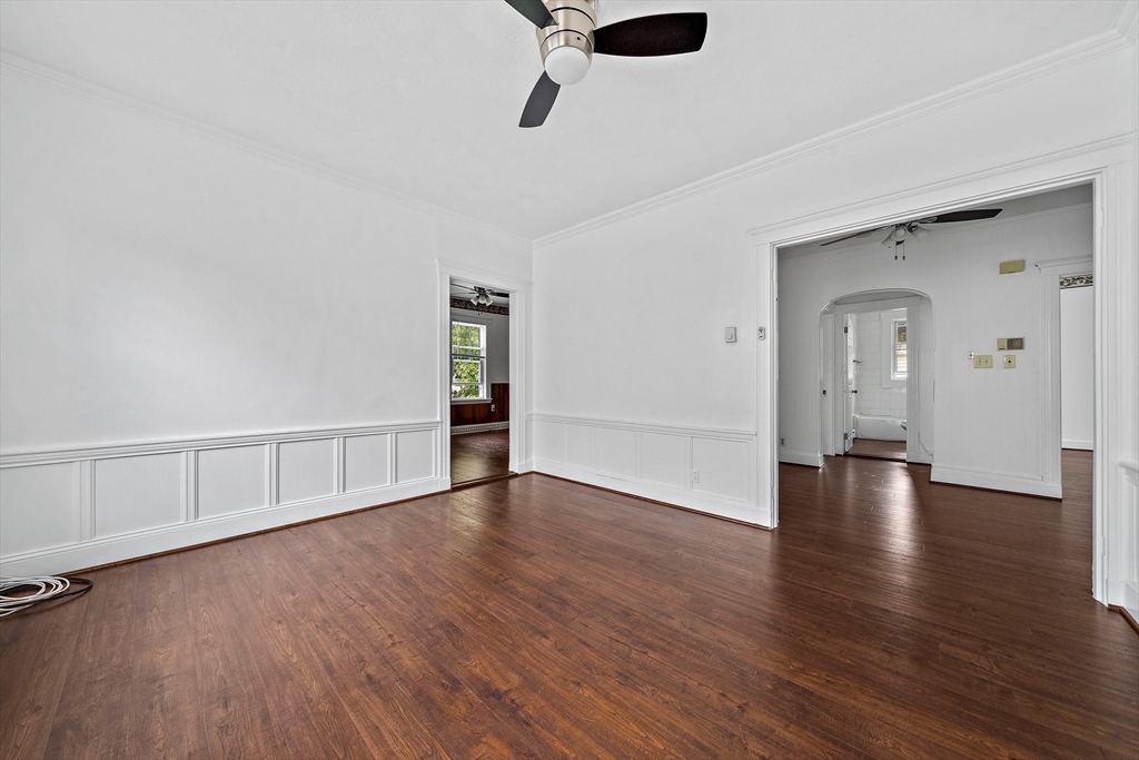 62 Favre Street, Unit 2 Boston, MA 02126 - Photo 19 of 24 a view of an empty room with wooden floor