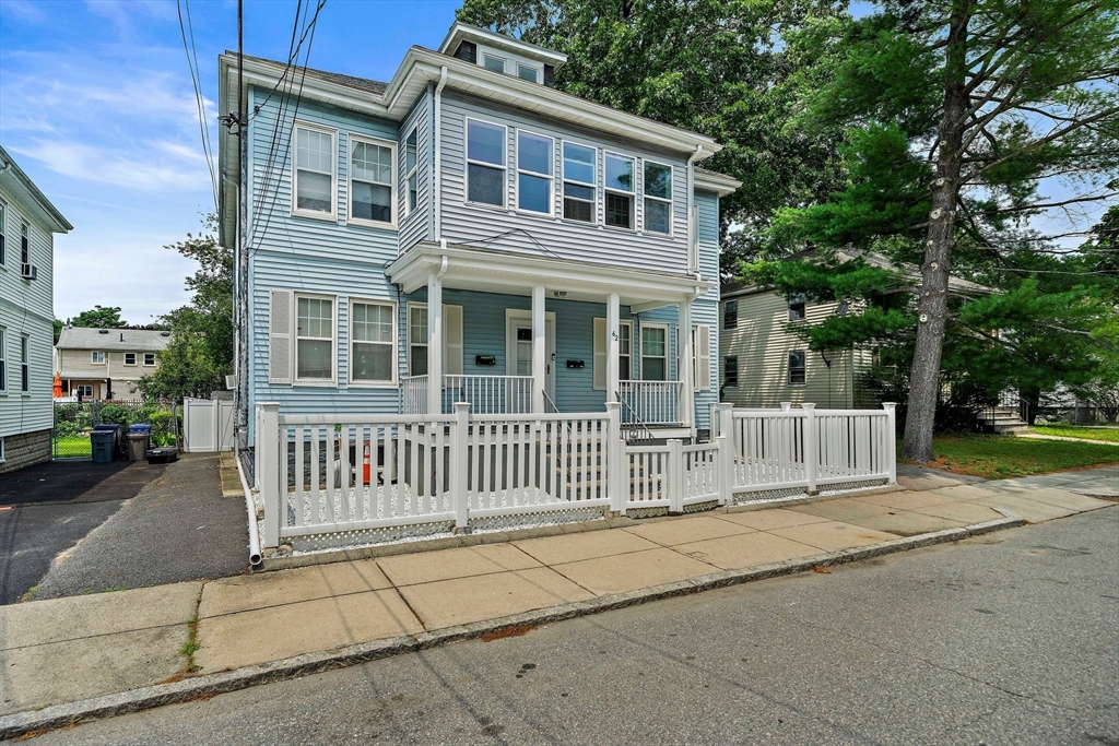 62 Favre Street, Unit 2 Boston, MA 02126 - Photo 2 of 24 front view of a house with a bench