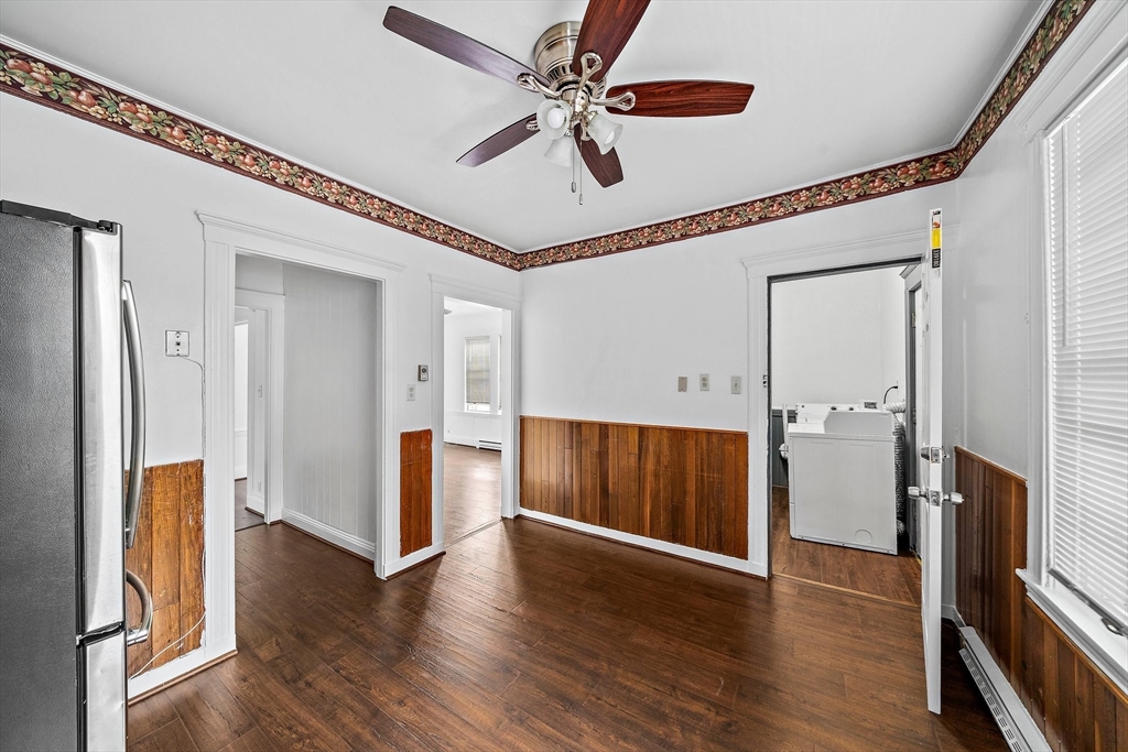 62 Favre Street, Unit 2 Boston, MA 02126 - Photo 7 of 24 a view of an empty room with wooden floor and a ceiling fan