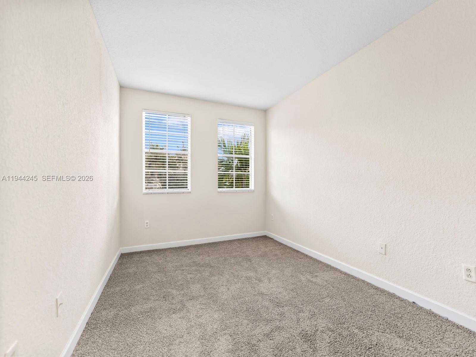 2441 Southeast 14 Street Homestead, FL 33035 - Photo 20 of 32 an empty room with a window