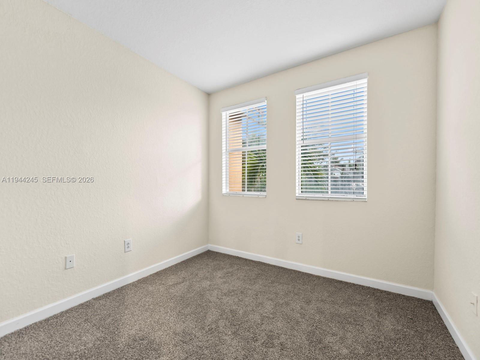 2441 Southeast 14 Street Homestead, FL 33035 - Photo 22 of 32 an empty room with a window