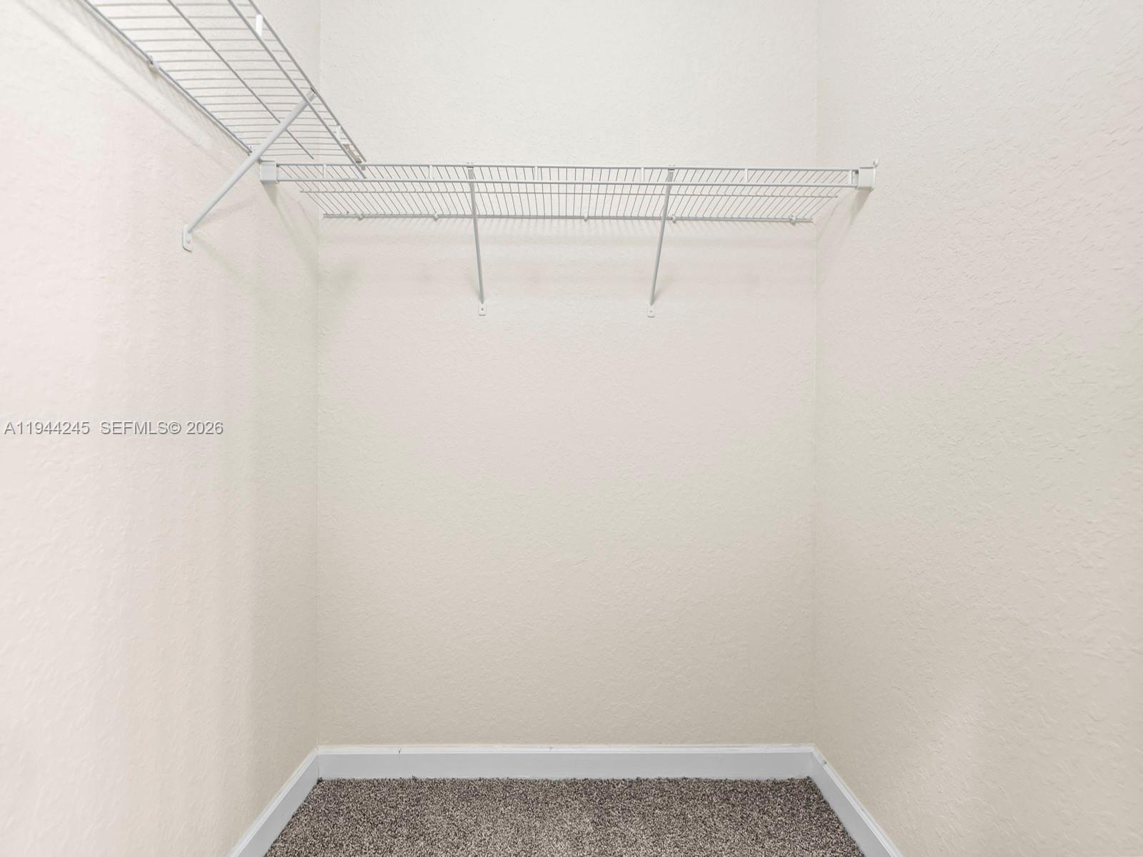 2441 Southeast 14 Street Homestead, FL 33035 - Photo 29 of 32 a view of a room with racks on the wall