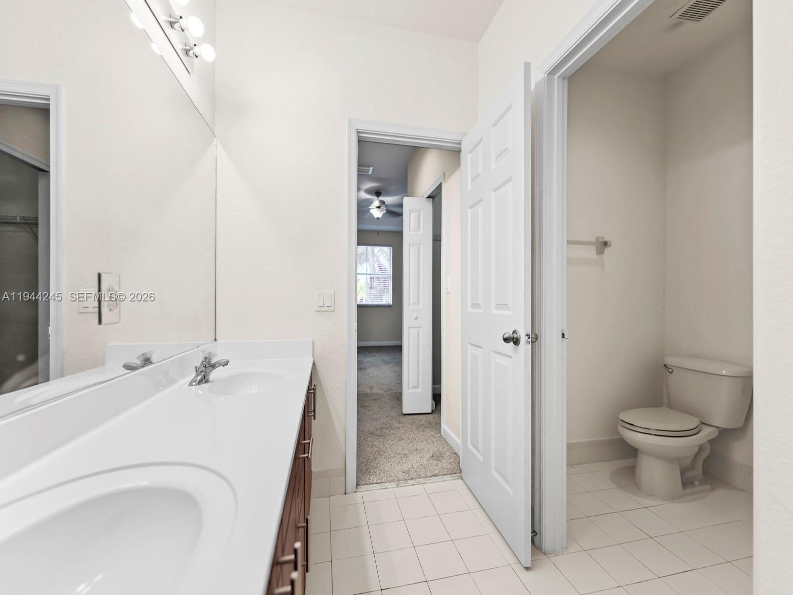 2441 Southeast 14 Street Homestead, FL 33035 - Photo 31 of 32 a bathroom with a sink toilet and shower