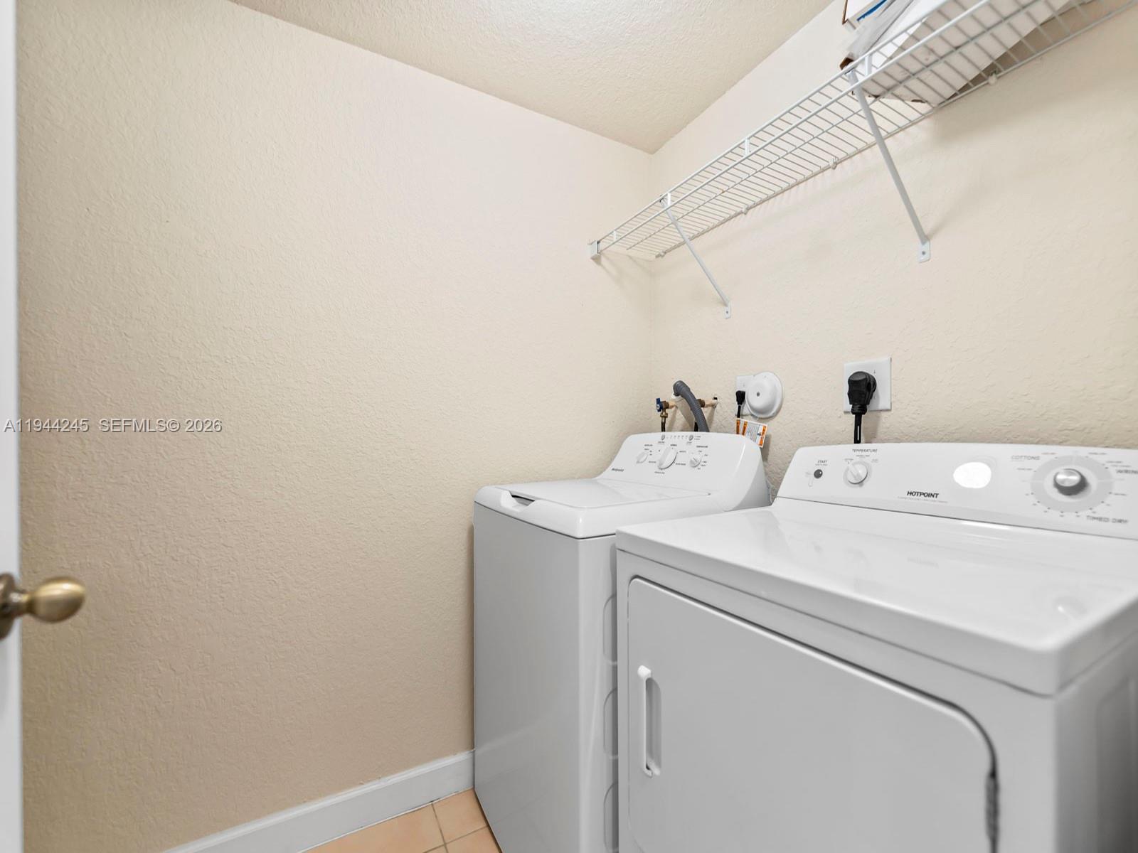 2441 Southeast 14 Street Homestead, FL 33035 - Photo 10 of 32 a utility room with dryer and washer