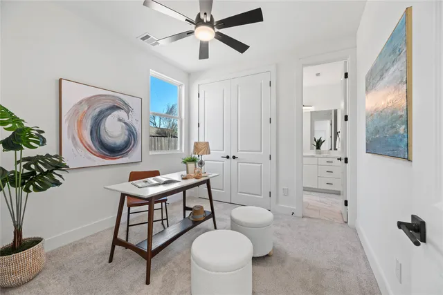 a reading room with furniture and a mirror