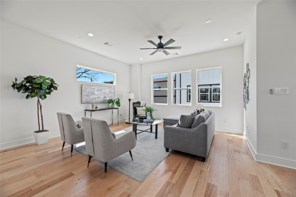 426 Sikes Street, Unit B Houston, TX 77018 - Photo 27 of 31 The living room is bathed in light from the windows. There’s lots of space to spread out. Photos of similar properties in the same development.