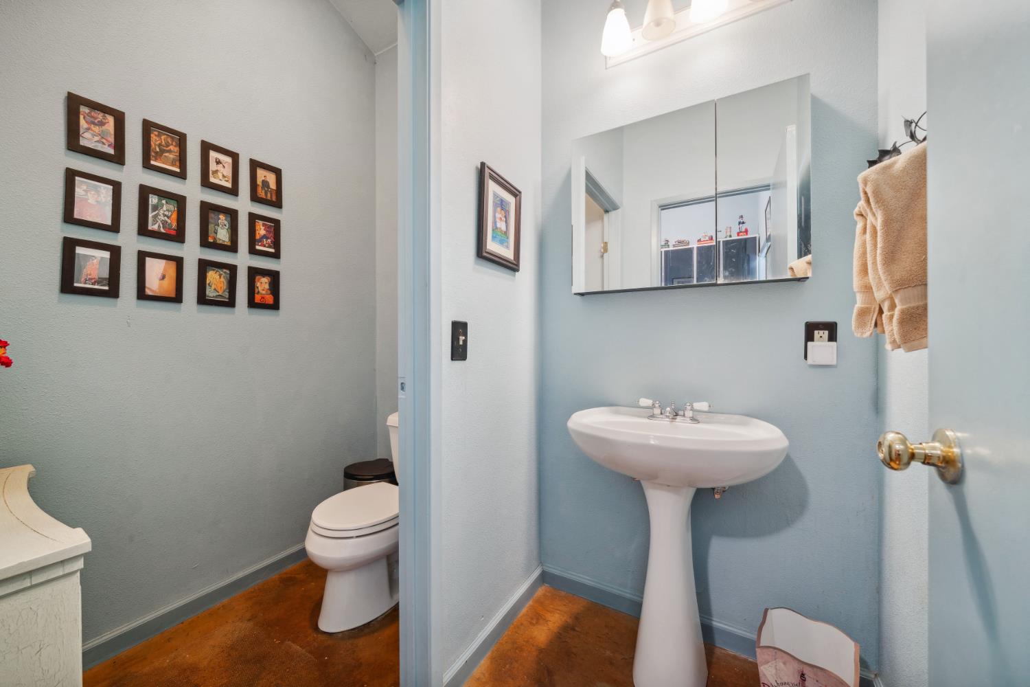 11321 New York Ranch Road Jackson, CA 95642 - Photo 17 of 73 a bathroom with a sink toilet and a mirror