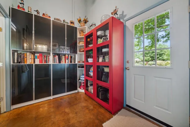 a group of people sitting in a living room