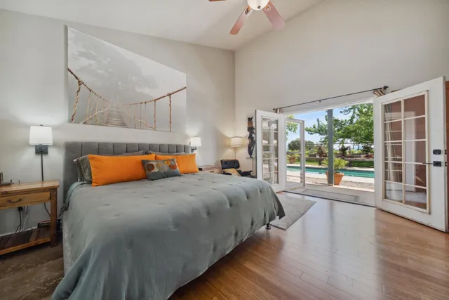 a bathroom with a sink a mirror and a bathtub