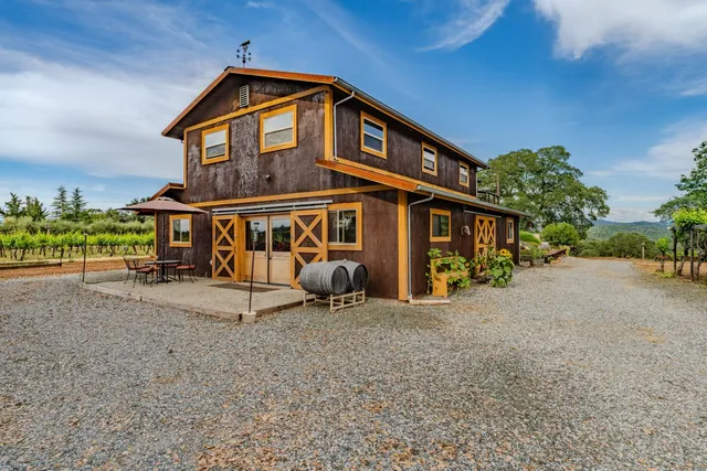an aerial view of residential house with outdoor space