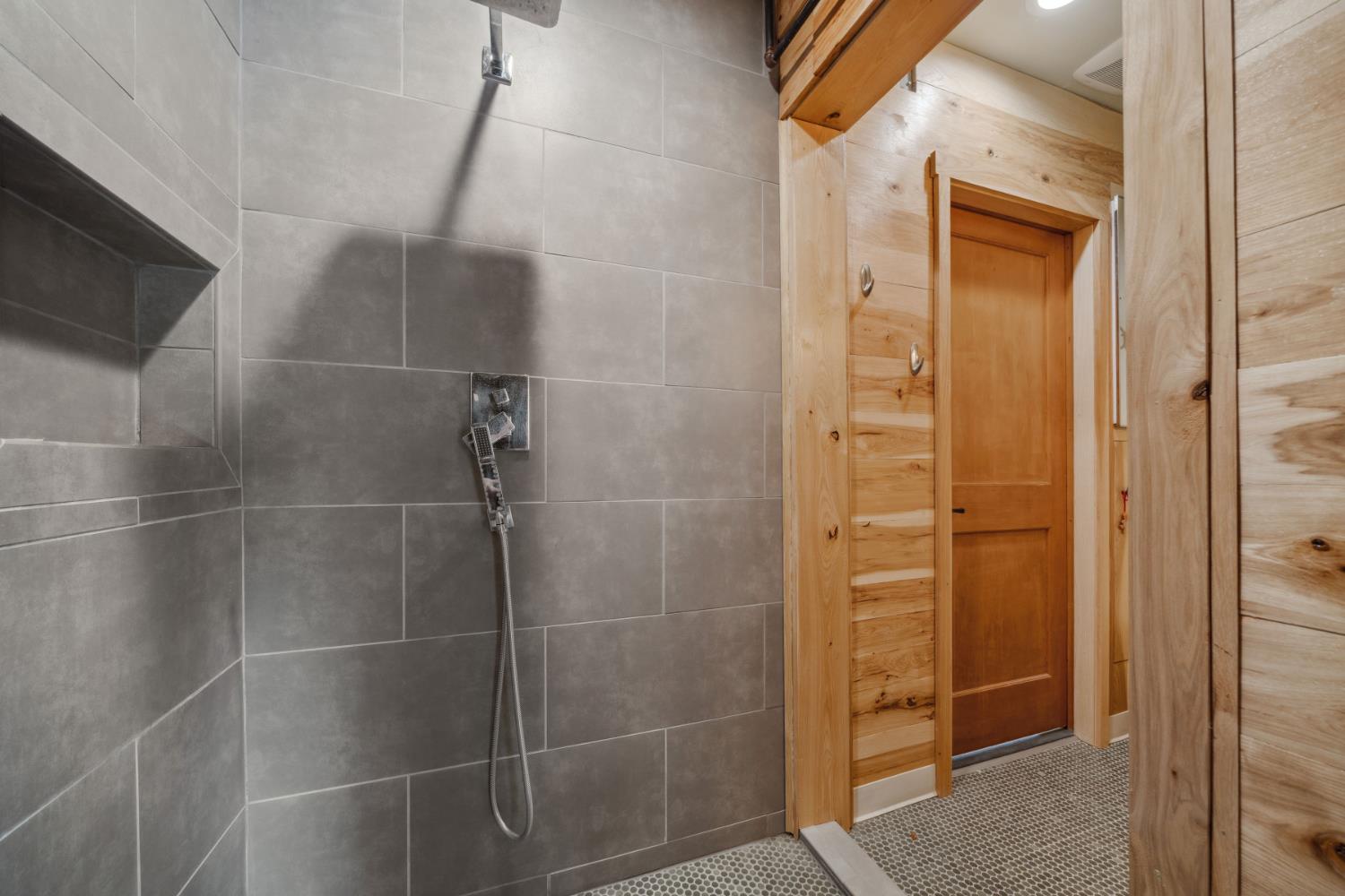 11321 New York Ranch Road Jackson, CA 95642 - Photo 54 of 73 a bathroom with a glass door shower