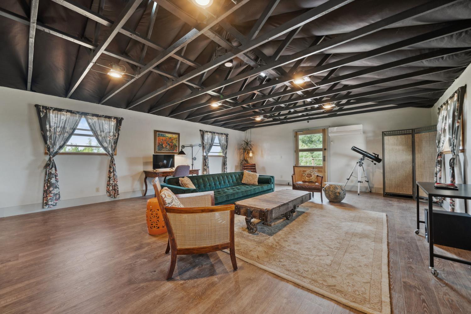 11321 New York Ranch Road Jackson, CA 95642 - Photo 55 of 73 a living room with furniture and a wooden floor