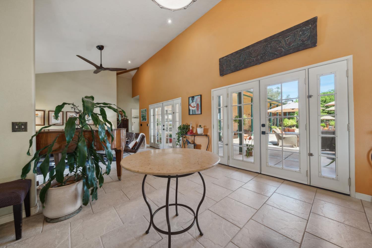 11321 New York Ranch Road Jackson, CA 95642 - Photo 8 of 73 a dining room with furniture and potted plants