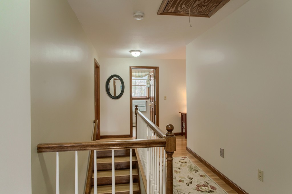 27 Ledge Road Chelmsford, MA 01863 - Photo 16 of 30 a view of staircase with wooden floor