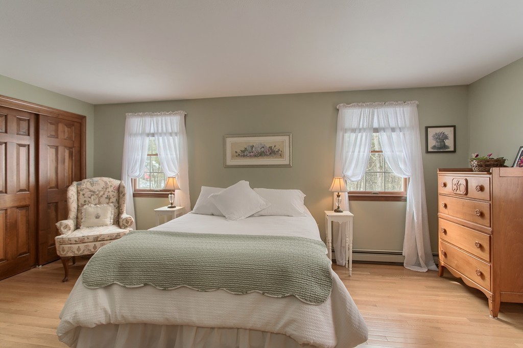 27 Ledge Road Chelmsford, MA 01863 - Photo 20 of 30 a bedroom with a bed and dresser
