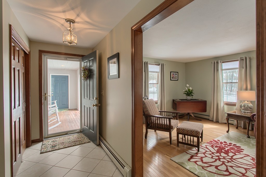 27 Ledge Road Chelmsford, MA 01863 - Photo 9 of 30 a living room with furniture and a window