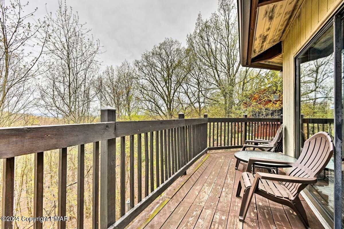 122 Elgin Way Bushkill, PA 18324 - Photo 18 of 32 a view of a two chairs in the balcony