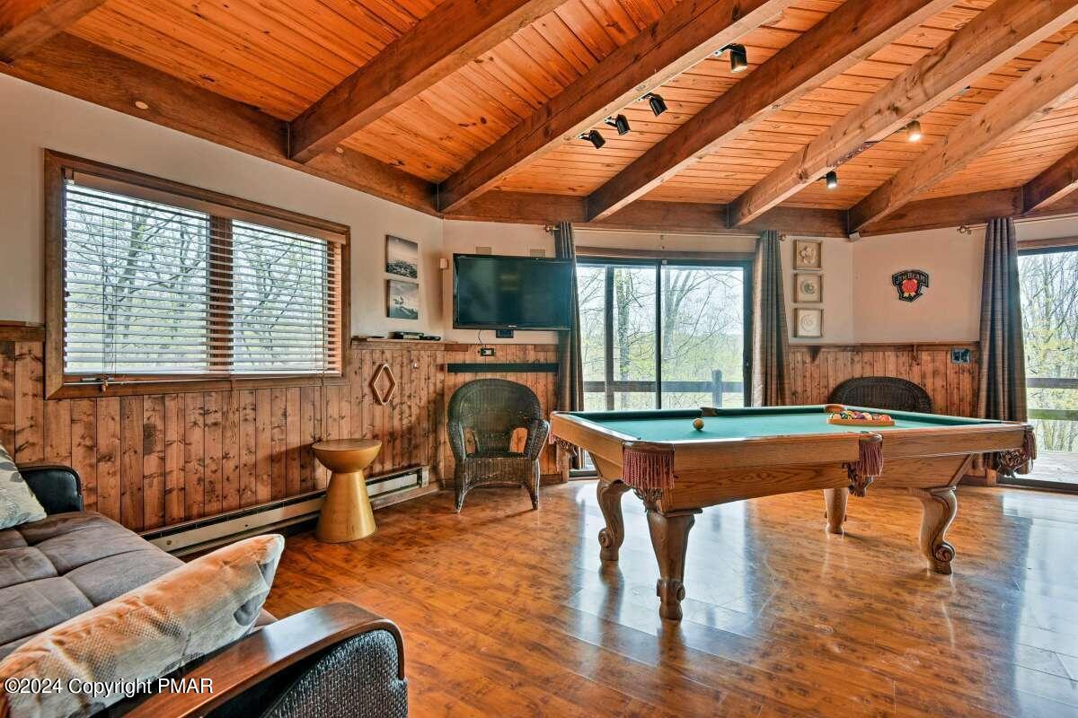 122 Elgin Way Bushkill, PA 18324 - Photo 8 of 32 a room with furniture pool table wooden floor and windows