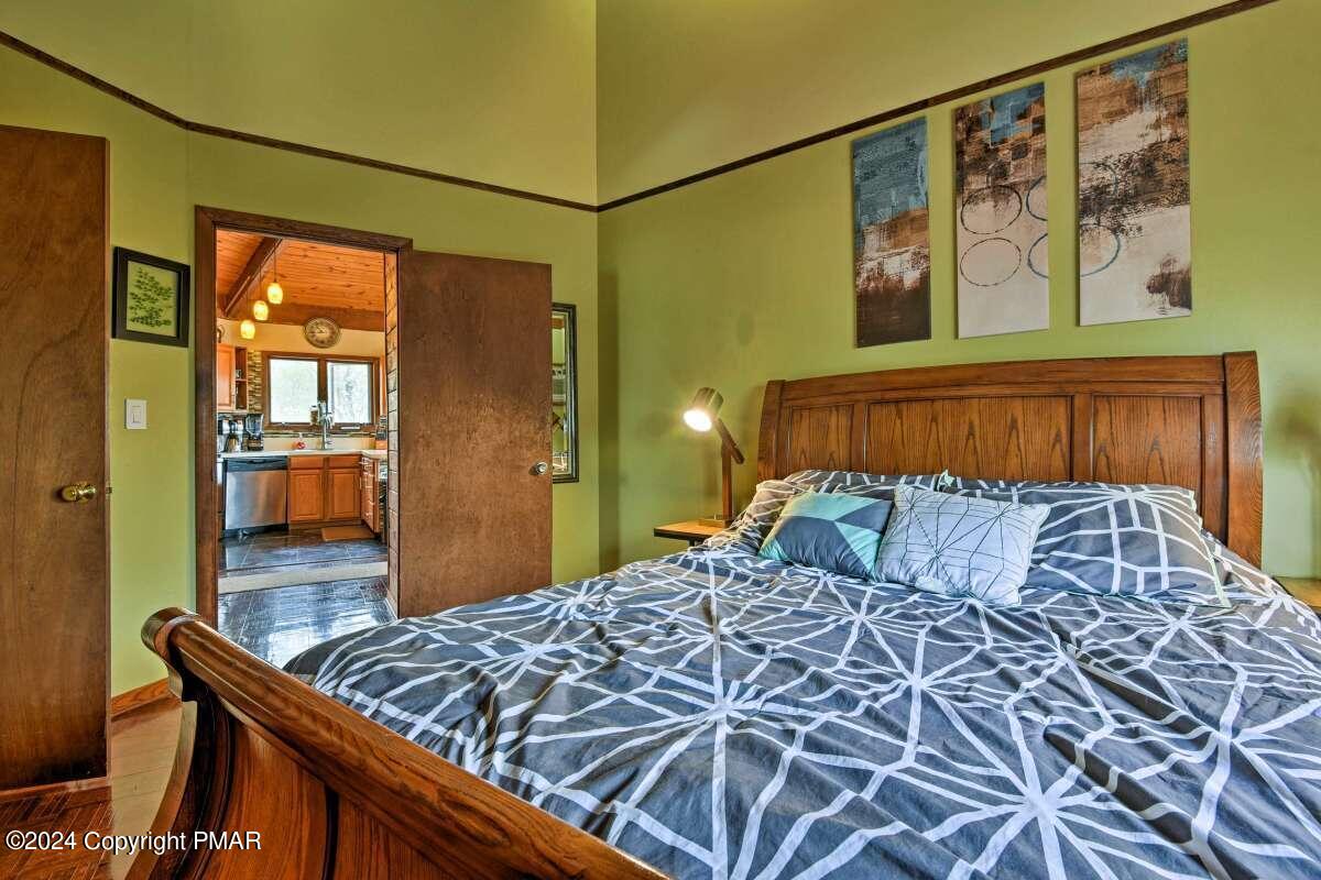 122 Elgin Way Bushkill, PA 18324 - Photo 10 of 32 a bedroom with a bed and a dresser