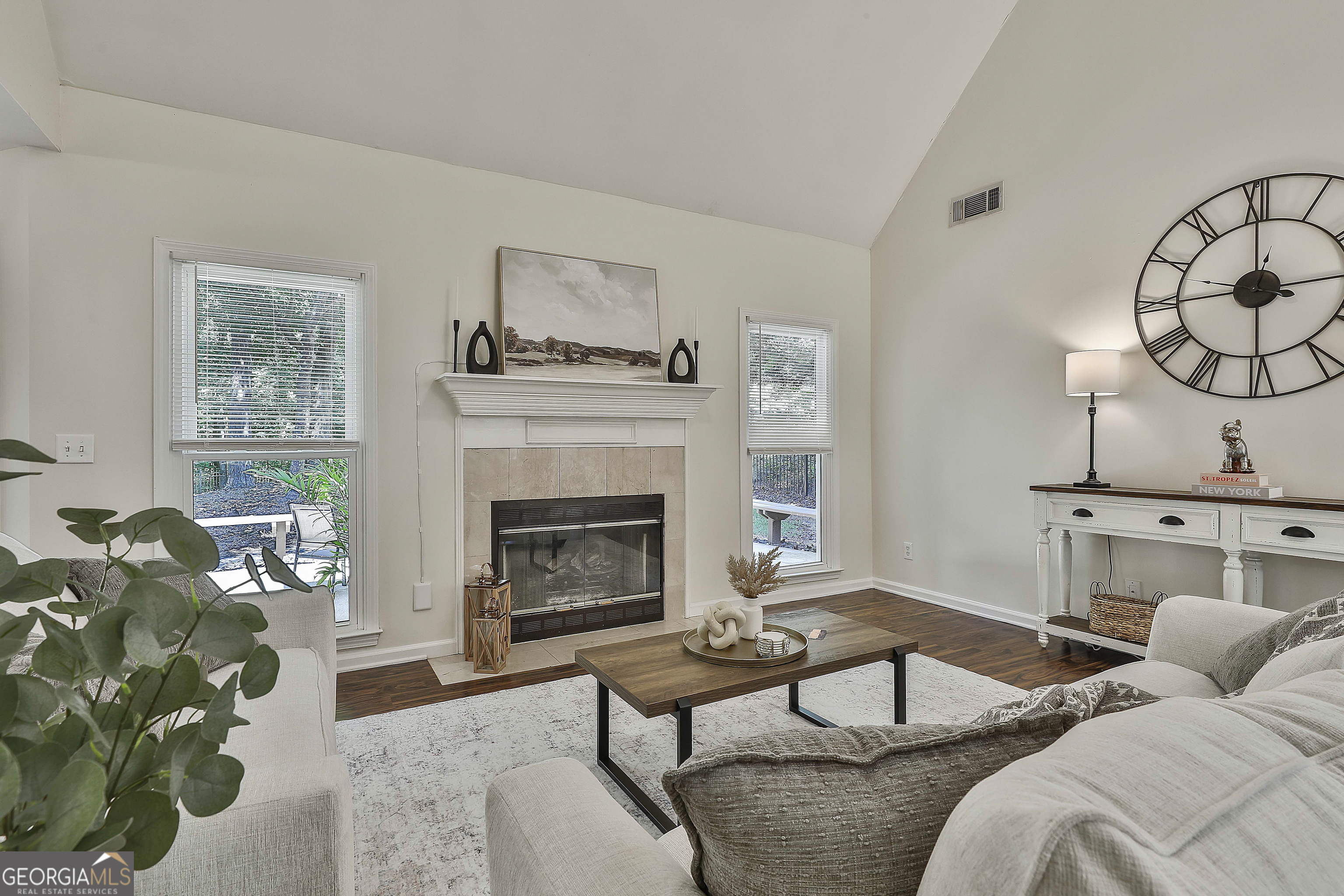 244 Terrane Ridge Peachtree City, GA 30269 - Photo 11 of 44 a living room with furniture and a fireplace