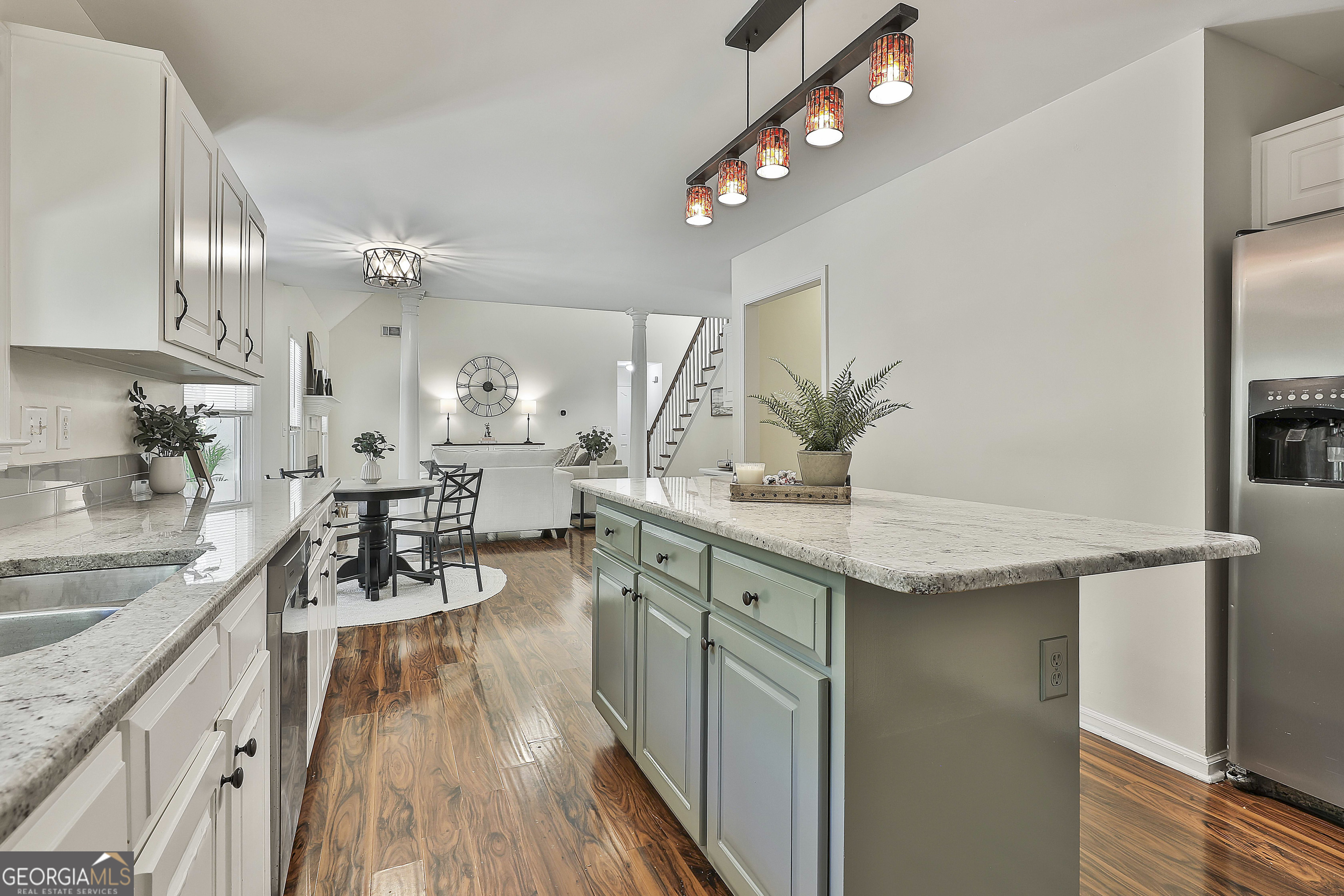 244 Terrane Ridge Peachtree City, GA 30269 - Photo 17 of 44 a kitchen with sink stove and cabinets