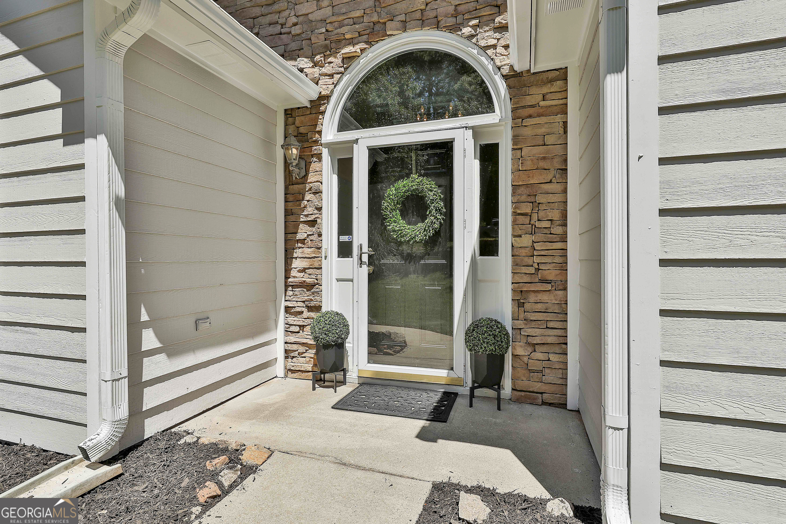 244 Terrane Ridge Peachtree City, GA 30269 - Photo 2 of 44 a view of entryway with a bathtub