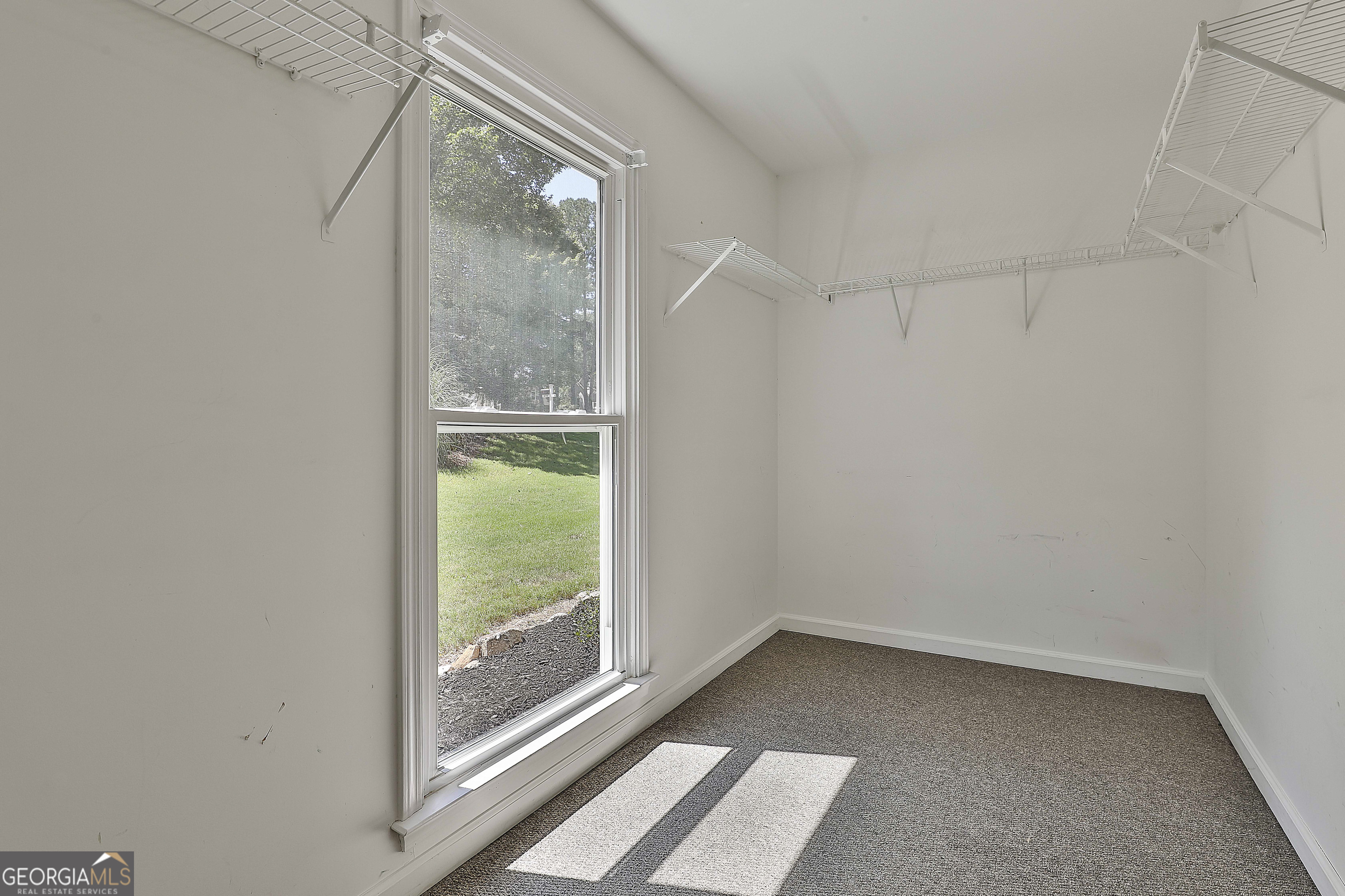 244 Terrane Ridge Peachtree City, GA 30269 - Photo 22 of 44 a view of an empty room