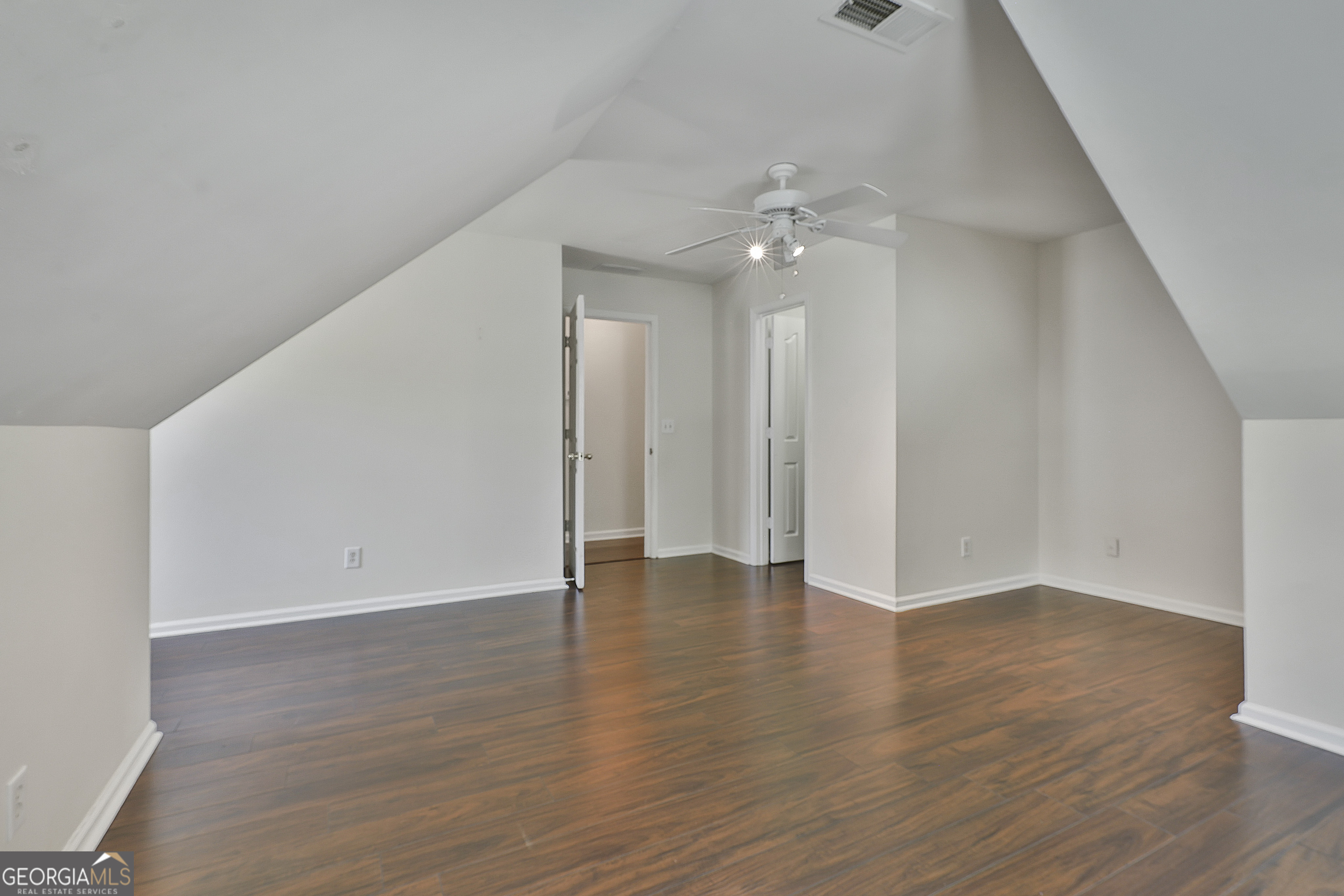 244 Terrane Ridge Peachtree City, GA 30269 - Photo 27 of 44 a view of an empty room with wooden floor