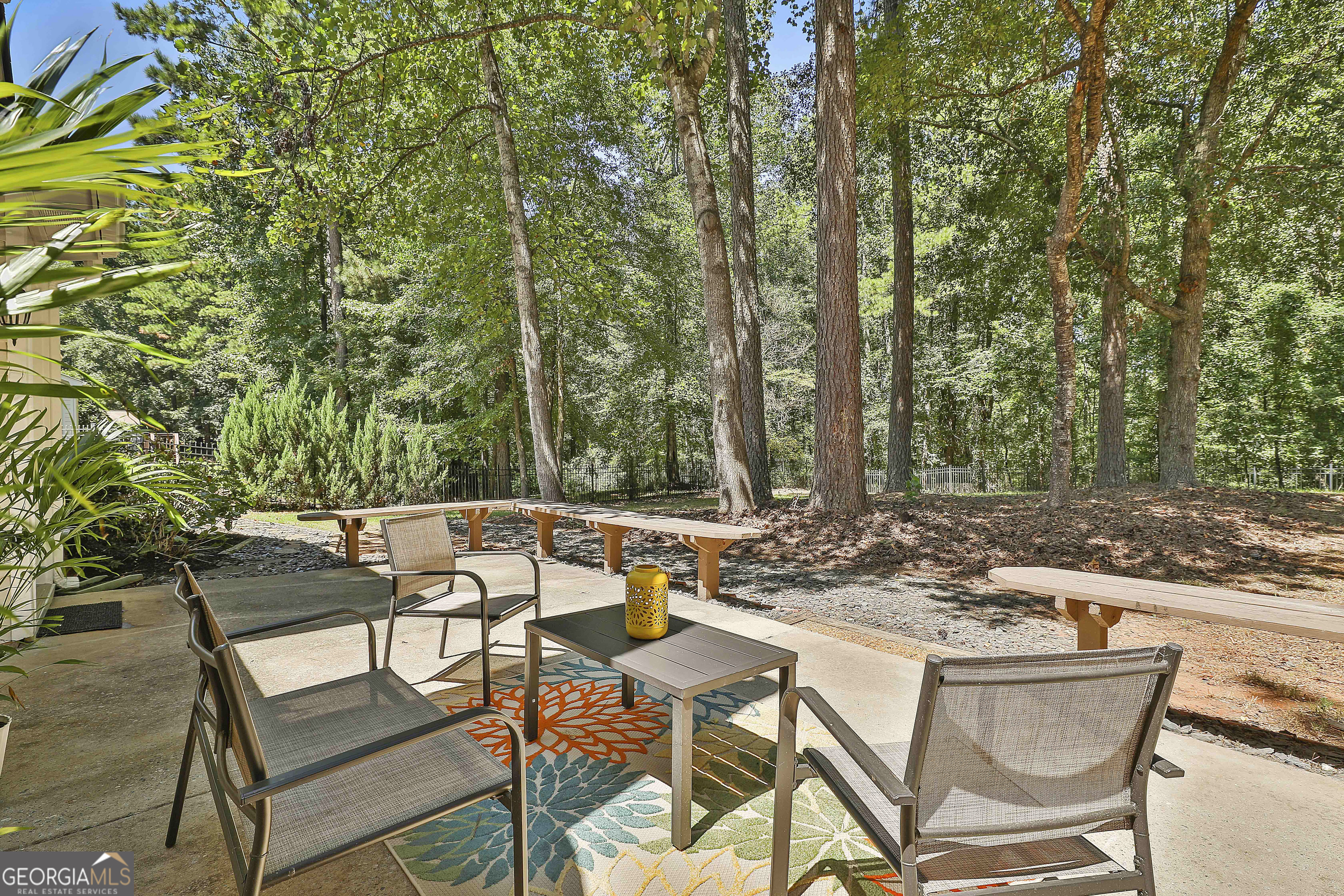 244 Terrane Ridge Peachtree City, GA 30269 - Photo 29 of 44 a view of a chairs and table in the patio