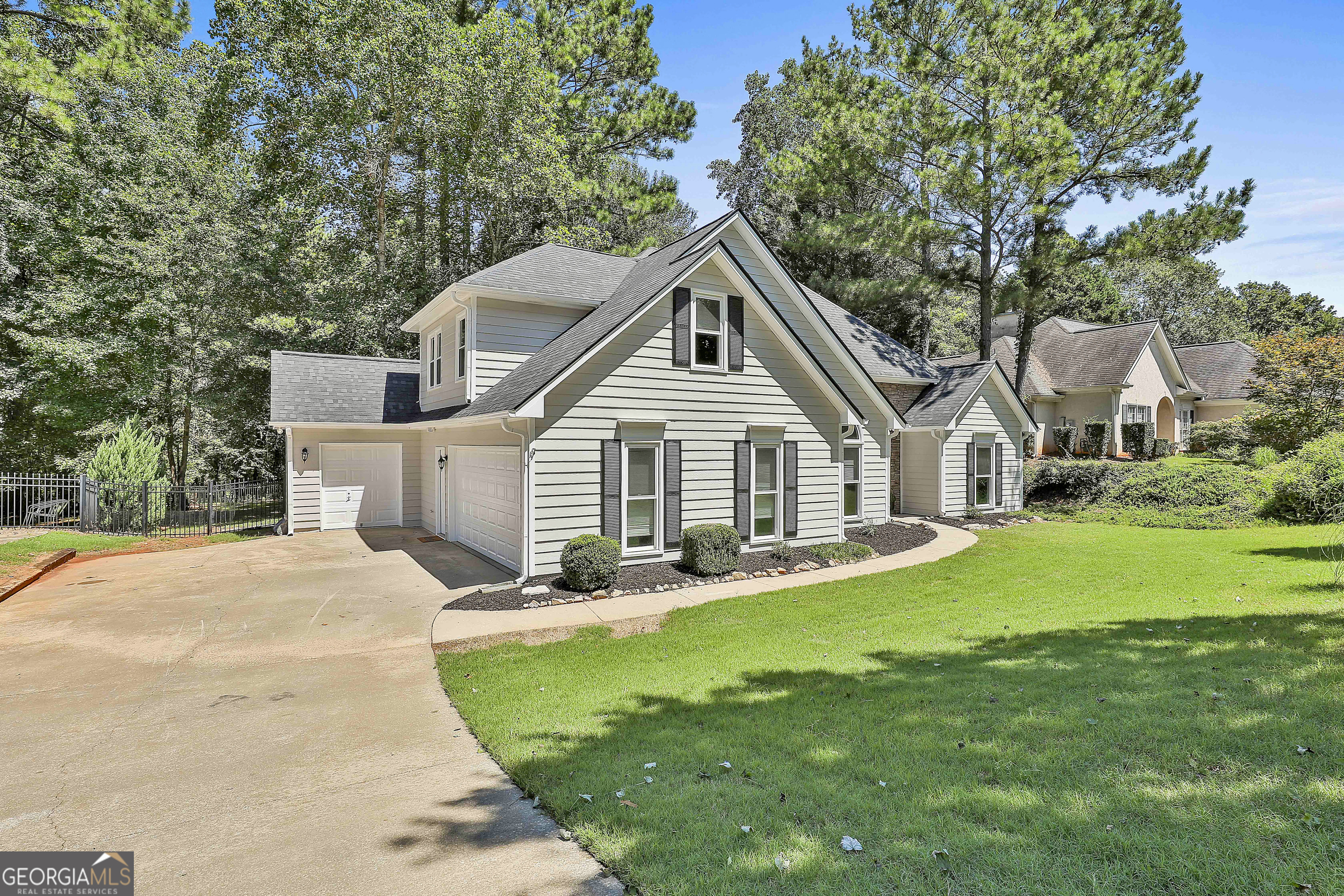 244 Terrane Ridge Peachtree City, GA 30269 - Photo 33 of 44 a view of a house with a yard