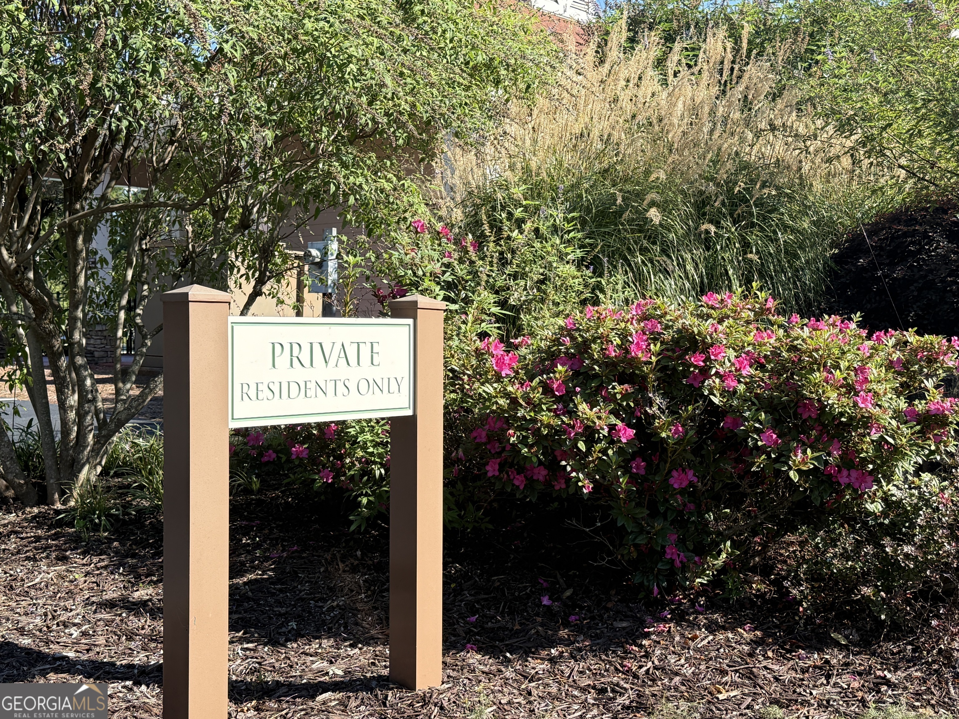 244 Terrane Ridge Peachtree City, GA 30269 - Photo 36 of 44 a sign that is in front of flowers